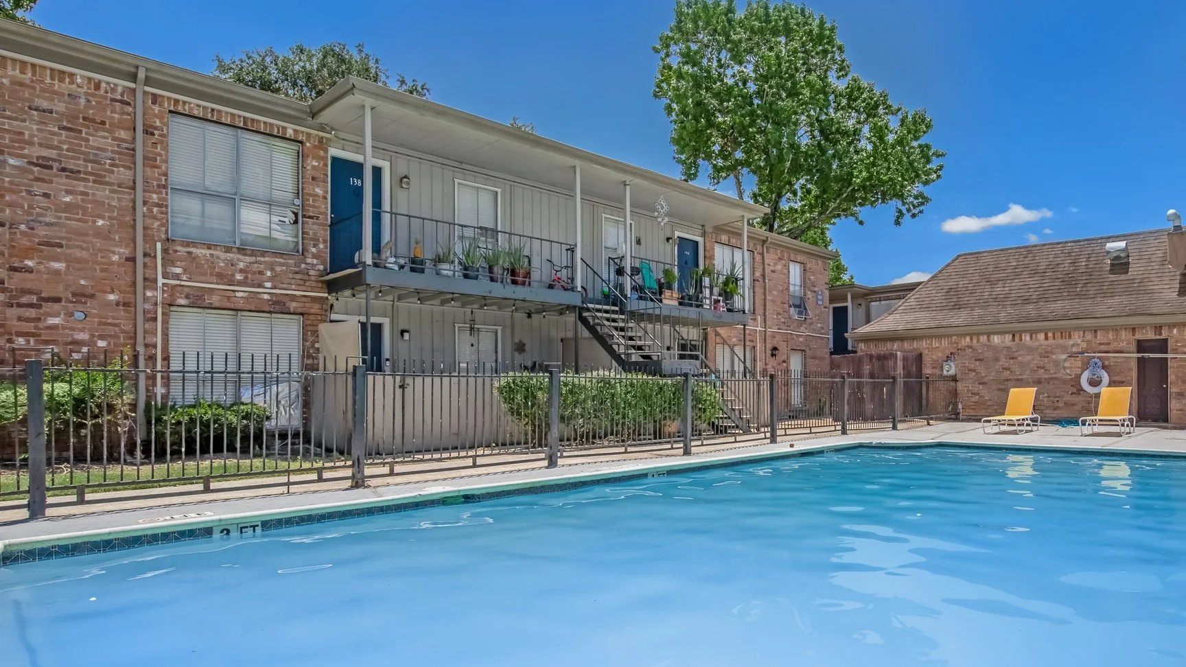 Apartment buildings and pool at La Primavera